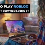 A person playing Roblox on a laptop in a cozy living room.